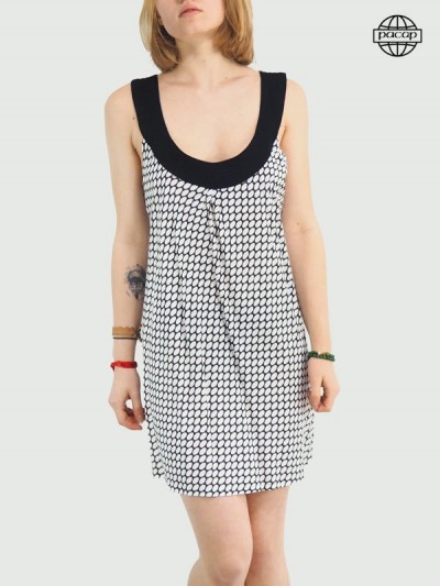 short black dress with white polka dots and décolleté