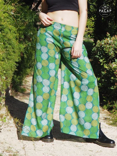 Green high waist wrap pants with adjustable waistband and polka dot print