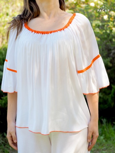 women's white flowing tee-shirt with ruffled mid-length sleeves