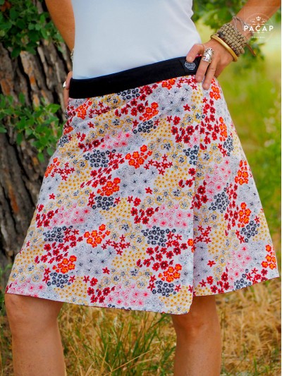 White and orange flared skirt for women. Wholesale skirts.
