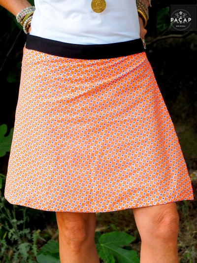 mid-length straight skirt, snap buttons, thin belt