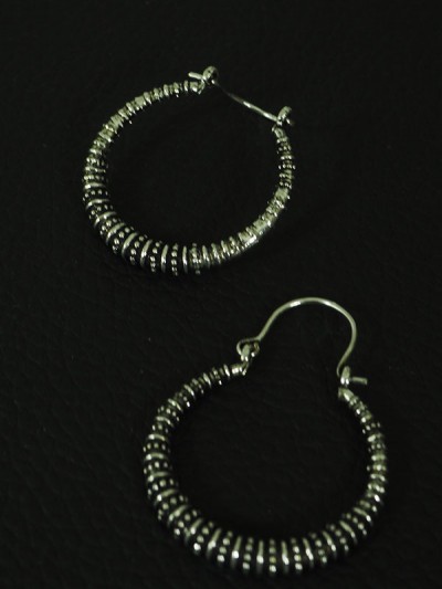 Medium silver and chiselled Indian Creole earrings in African ethnic style with bezels