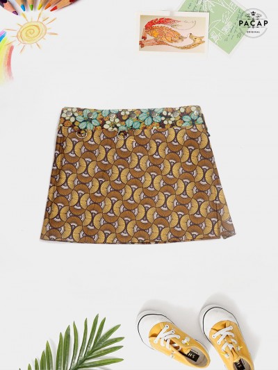 Brown girl's skirt with fan pattern