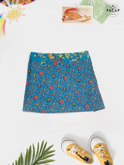 Girls' reversible skirt with double-patterned waistband
