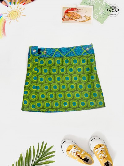 Girl's apple green skirt with kiwi motif