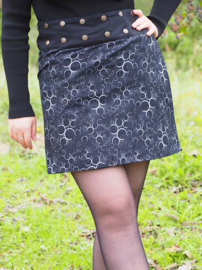 Wrap skirt with buttons in front of geometric pattern