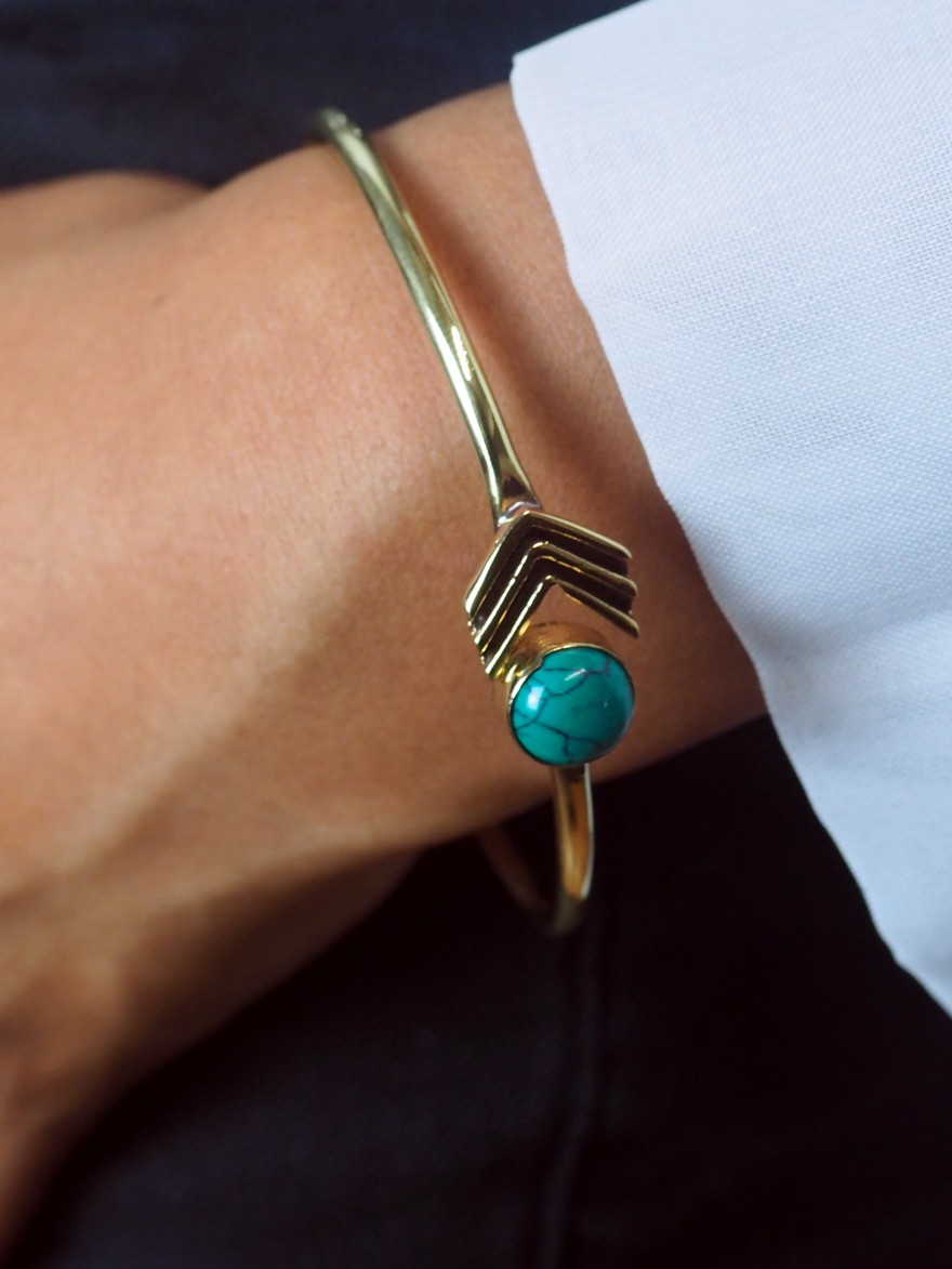 Adjustable golden arrow bracelet with natural chrysocolla stone