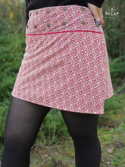 mini jupe portefeuille blanche à motif rouge floral bouton pression pacap