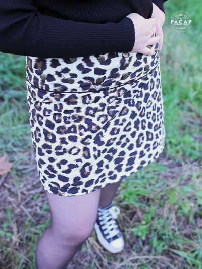 white skirt leopard print wide belt