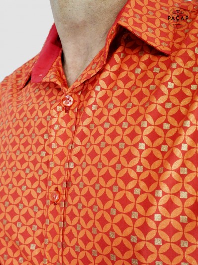 red geometric print shirt