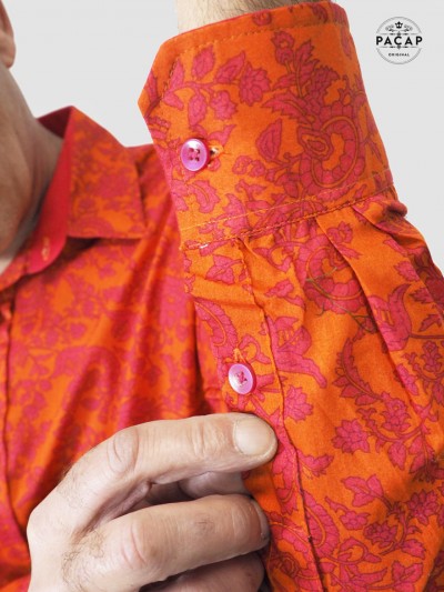 slim-fitted orange shirt with pink floral print