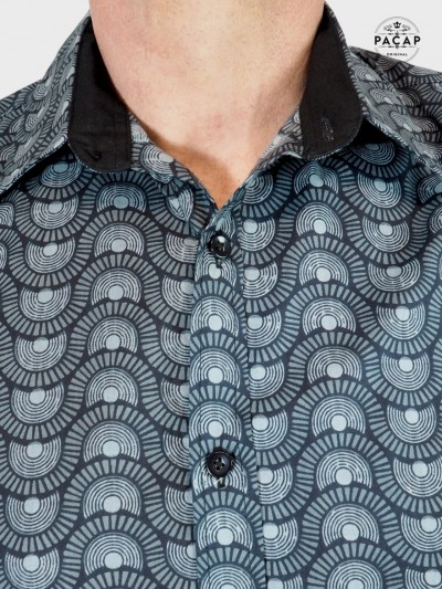black shirt with mother of pearl button print