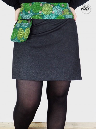 Black denim skirt with green polka dot pattern