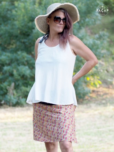 multicolored printed cotton wrap skirt with white tank top hat
