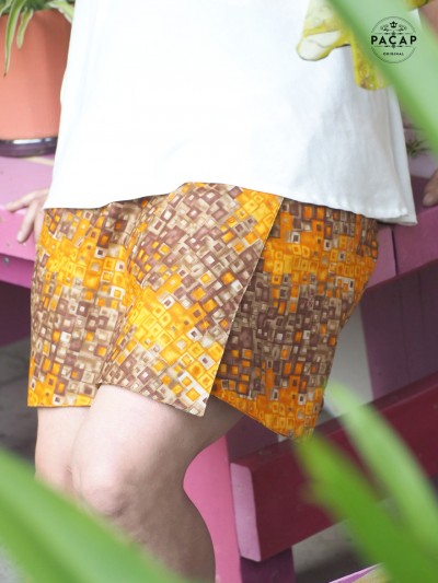 Adjustable orange and brown plaid reversible skirt