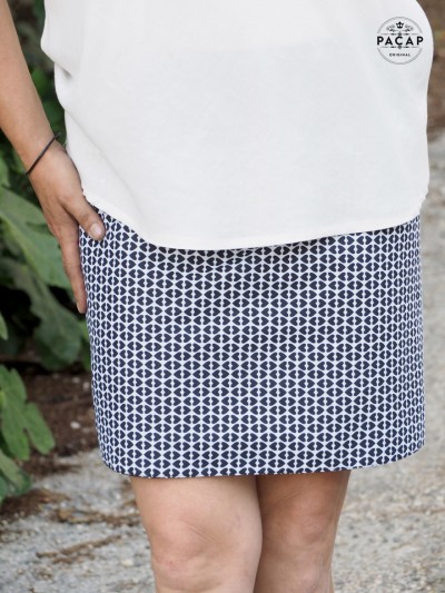 white skirt with black reversible hearts and slit