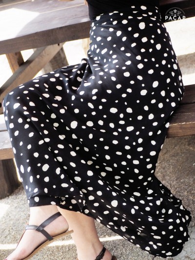 flowing black skirt with white polka dot print flounce