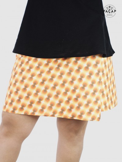 women's orange skirt with retro groove pattern