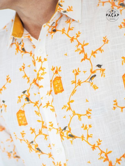 white shirt quality fabrics graphic print lantern franche argbre and golden orange birds