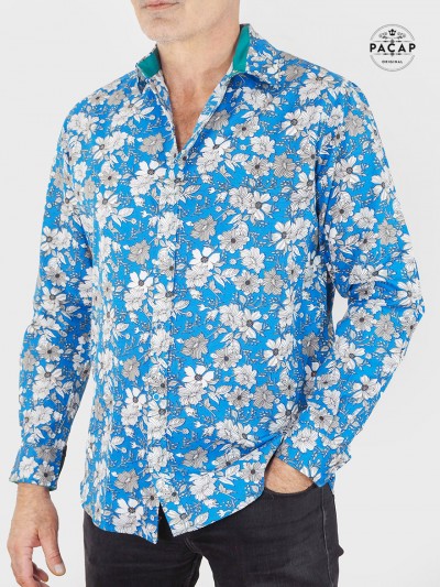 chemise bleue a fleurs à bouton pression argentée manche longue taille ajustée pres du corps